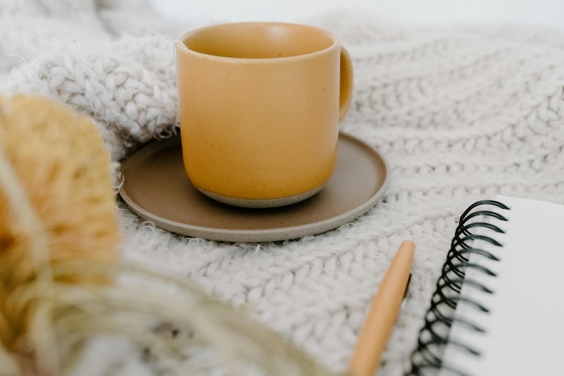 emotional grounding through senses. cup of tea on a blanket